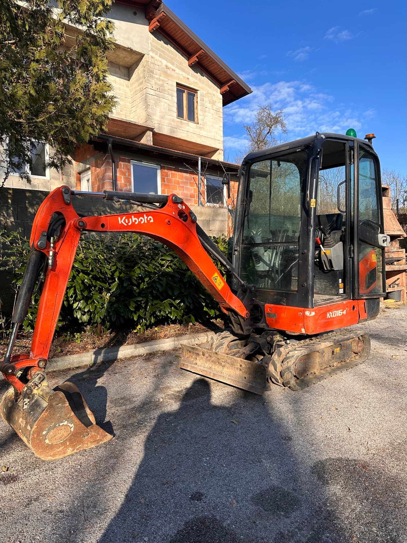 Narančasti Kubota mini bager